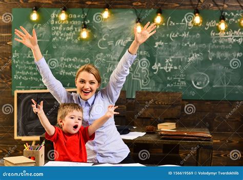 Mature Tutor Teacher Giving Private Lessons To Preschool Boy Back To School Teachers Are As