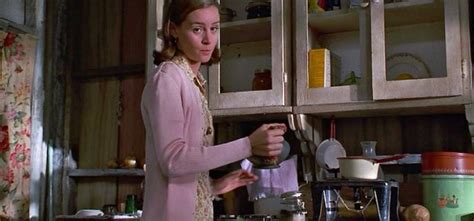 Miss Honey pours tea in her cottage-Matilda - Hooked on Houses