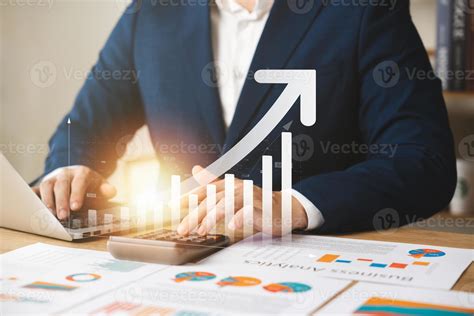 Businessman analyzing company growth, future business growth arrow