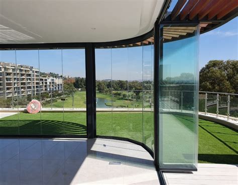 FRAMELESS GLASS DOORS BALUSTRADE FACADES SHUTTERS