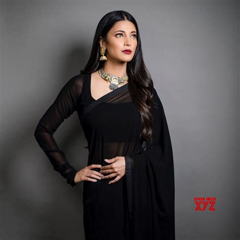 actress shruti haasan sexy  stills   black saree  hey ram