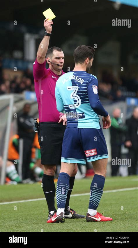 Wycombe Wanderers Joe Jacobson Is Shown The Yellow Card During The