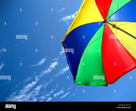 summer beach umbrella Stock Photo - Alamy