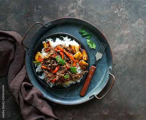 Latin America Food Ropa Vieja With Fried Plantains And Rice Carne