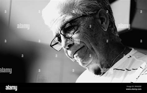 Mature Man In Emotional Turmoil Eyes Shut And In Despair Monochrome