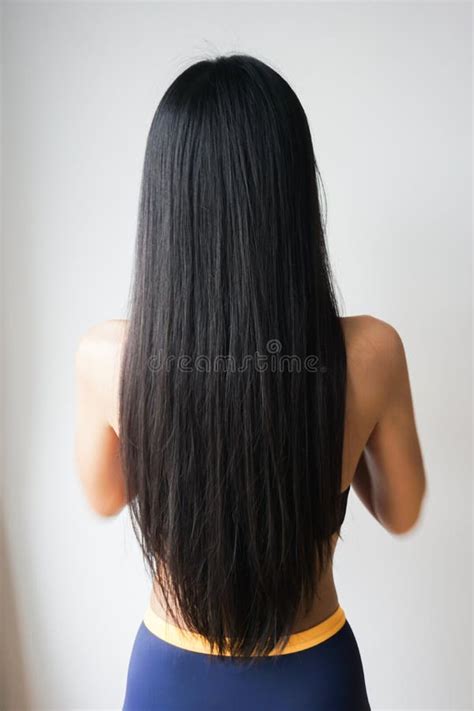 Back View Of Woman With Beautiful Long Straight Black Hair Stock Image