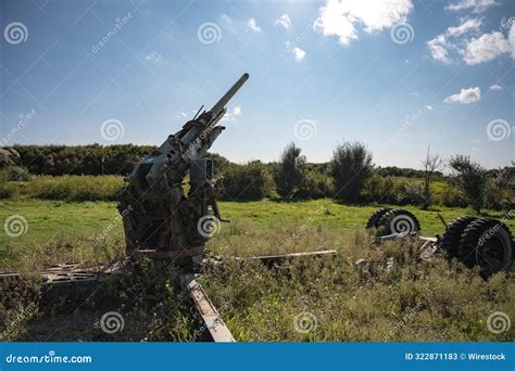 Old Anti Aircraft Gun From The Second World War In A Field In Normandy