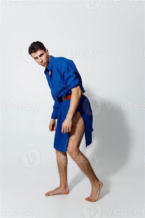 Man In A Blue Dress On A Light Background Gay Model Stock Photo At Vecteezy