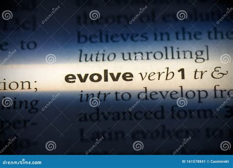 EVOLVE Word Made With Wooden Blocks Concept Stock Photo CartoonDealer