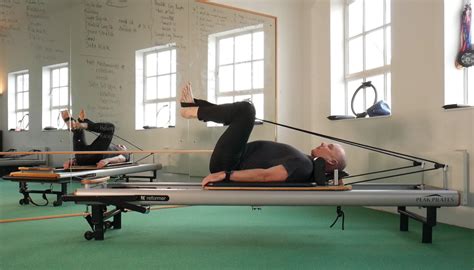 Reformer Feet In Straps Birmingham Pilates Studios