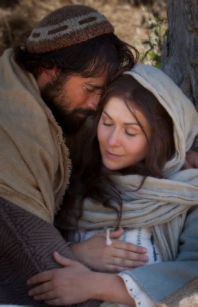 Mary and Joseph Rest while on Their Journey to Bethlehem