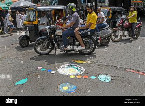 Mumbai India Th Sep Motorcyclists Ride Past A Pothole