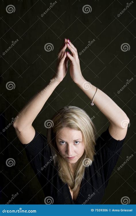 Pretty Blonde Woman With Her Hands Above Her Head Stock Photo Image