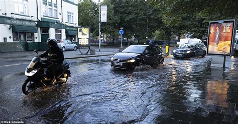 Flooding Causes Delays On Tube And Roads Are Left Underwater In London