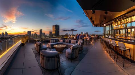 Rooftop Bar At Sunset Cityscape View With Bar Outdoor Lounge Area