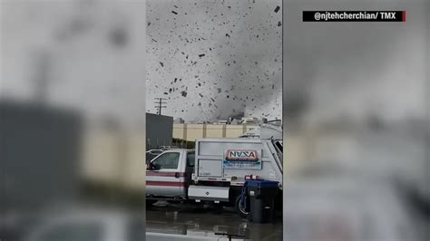 VIDEO: Rare tornado near Los Angeles rips building roofs