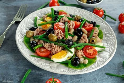 Fresh Tuna Green Bean Salad With Eggs Tomatoes Beans Olives On White