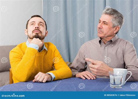 Mature Father And Son Serious Talk Stock Photo Image Of Advising Offense