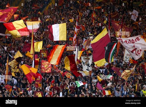 AS Roma fans wave flags in the stands during the UEFA Champions League ...