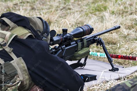 Military sniper aims at a target Stock Photo | Adobe Stock