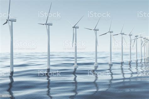 White Wind Turbine Generating Electricity In Sea Ocean Clean Energy Wind Energy Ecological