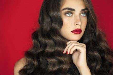 Premium Photo Beauty Portrait Of Attractive Brunette Woman On A Dark Grey Background