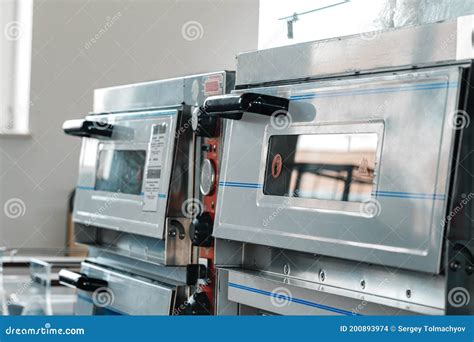 Two Industrial Pizza Ovens in a Shop Stock Photo - Image of baker ...