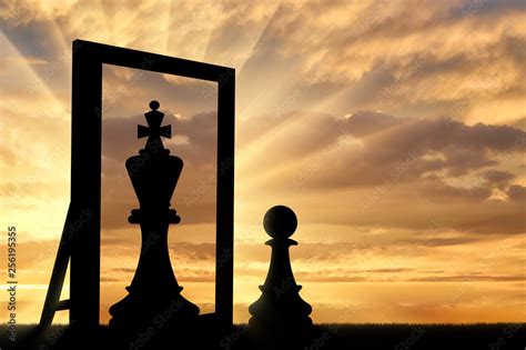 Silhouette Of A Pawn Sees Himself In The Reflection Of The Mirror