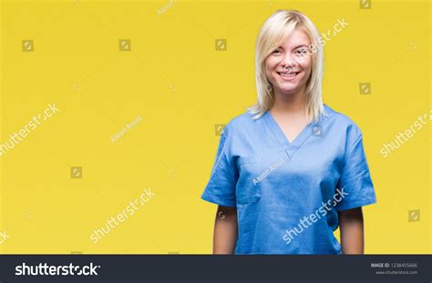 Junge schöne blonde Krankenschwester Ärztin auf Stockfoto 1238455666
