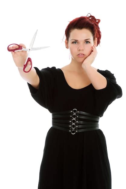 Premium Photo Portrait Of Woman Holding Scissors Against White Background