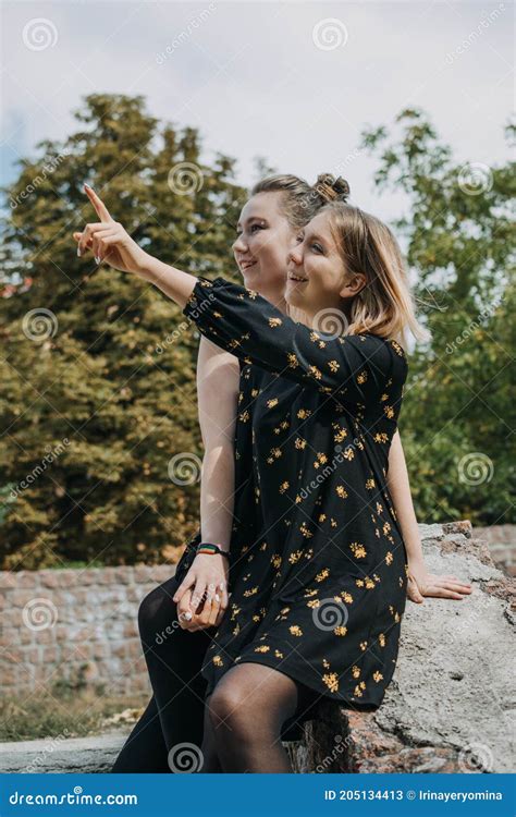 Lgbt Lesbian Couple Love Moments Concept Two Young Lesbians Girls Hugging And Walking Outdoors