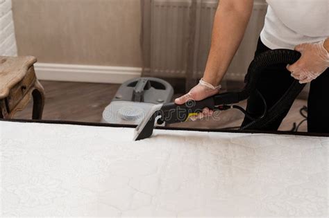 Dry Wash Cleaner Is Removing Dirt And Dust From Mattress Using Dry