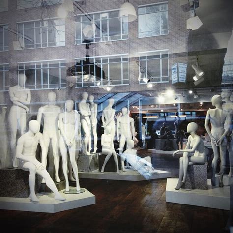 Premium Photo Nude Male Mannequin Standing Against Built Structure