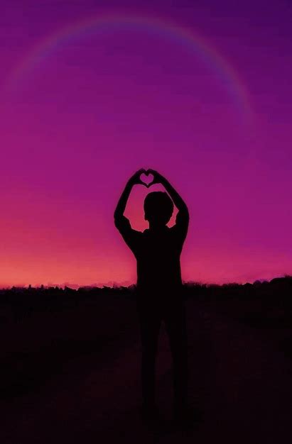 Premium Photo Silhouette Man With Arms Raised Standing Against Sky