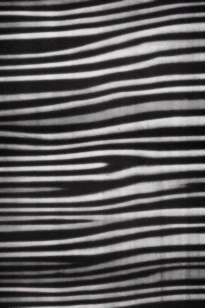 Premium Photo | Black and white photograph of a striped fabric with the ...