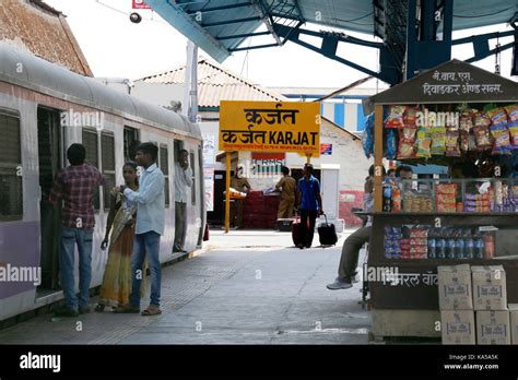 Karjat railway station, railway platform stall, sign board in English, Hindi, Marathi, Thane ...