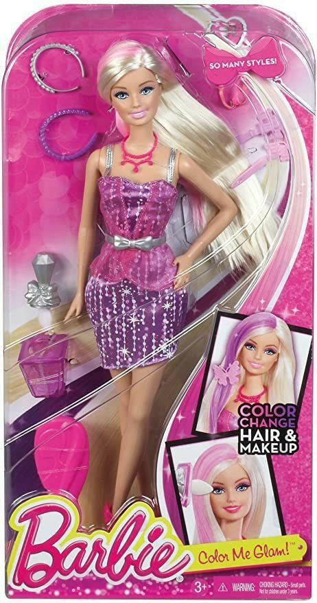 A Barbie Doll With Blonde Hair And Pink Dress In The Packaging For Her