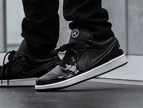 DD1650 001 Que Vaut La AJ1 Low SE Patent Leather ASW Black White