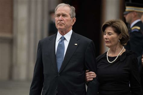 Former President George W. Bush and his wife Laura - NARA & DVIDS