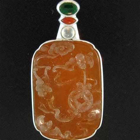 Jade Natural Carved Orange International Gem Society