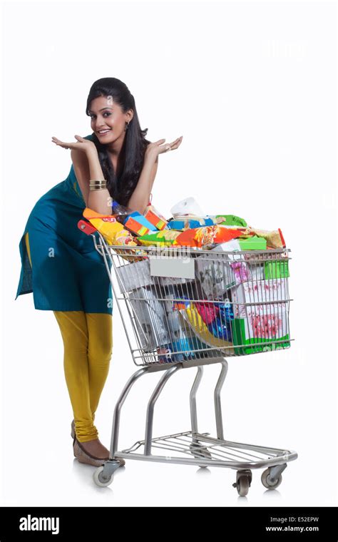 Portrait Of A Woman With A Shopping Cart Stock Photo Alamy