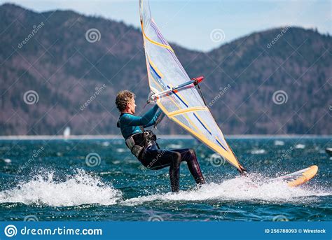 Windsurfer Sailing On The Water In Walchensee In Bavaria Editorial