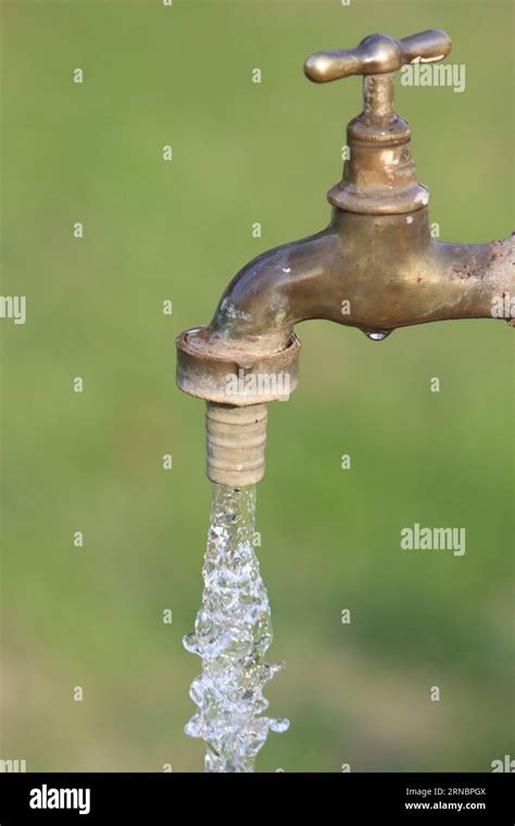 Drinking Water Coming Out Of A Tap Stock Photo Alamy