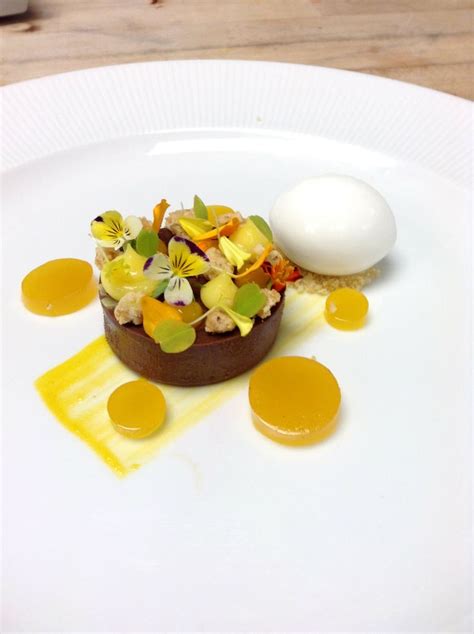 Dark Chocolate Cremeux Coconut Sorbet Hazelnut Streusel Passion Fruit Curd And Gelee