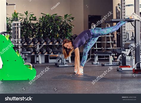 Athletic Brunette Female Fitness Model Stretching Stock Photo Shutterstock