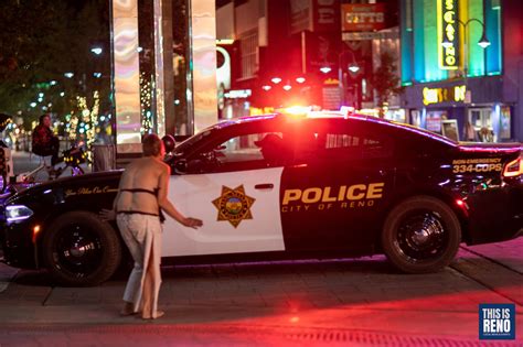 Semi-nude woman creates a stir in downtown Reno (photos)
