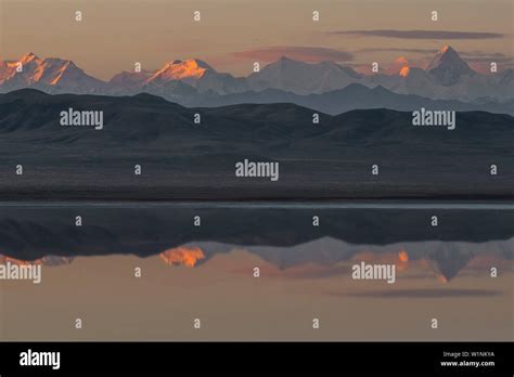 Reflection Of Tallest Tien Shan Peaks Among Them Khan Tengri Peak