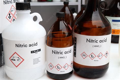 Nitric acid, Hazardous chemicals and symbols on containers Stock Photo | Adobe Stock