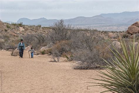 Mother And Son Hiking In The Desert By Stocksy Contributor Adam Nixon Stocksy