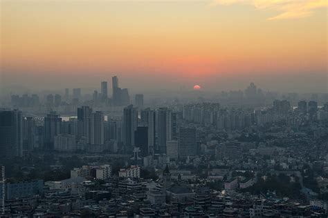 "Sunset Over Seoul Skyline, South Korea" by Stocksy Contributor "Tom ...